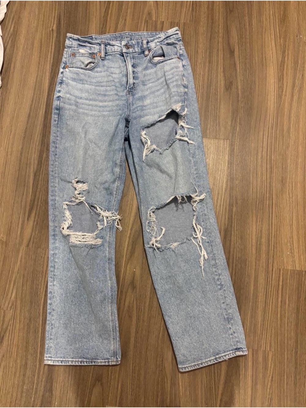 American Eagle Outfitters light blue distressed straight leg jeans